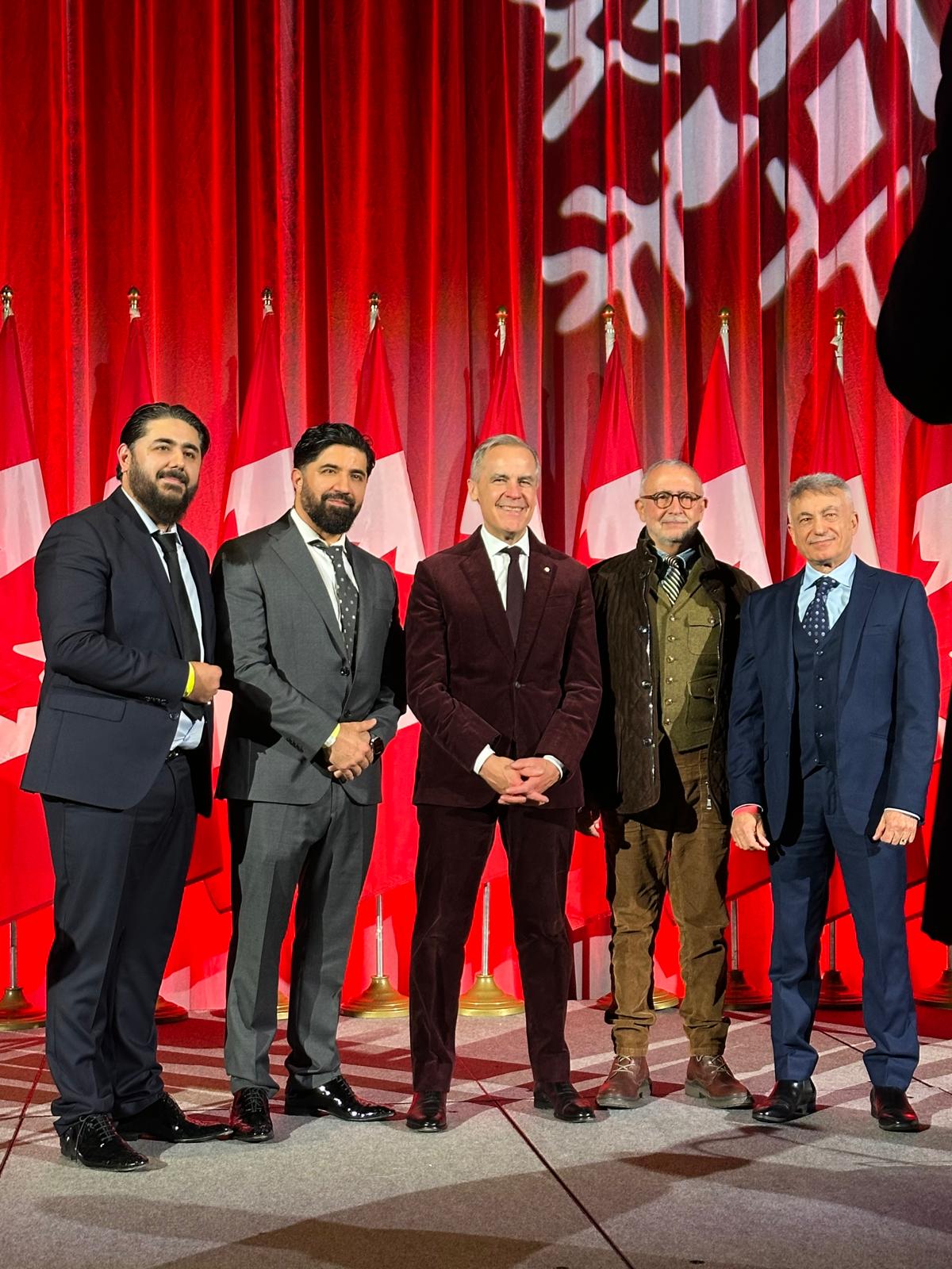 James Noor Akbari and Habib Akbari with Prime Minister Mark Carney and Canadian business leaders
