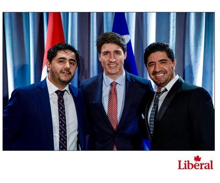 James Noor Akbari and Habib Akbari with Prime Minister Justin Trudeau